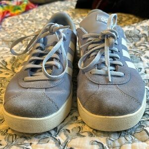 Adidas court sneakers.